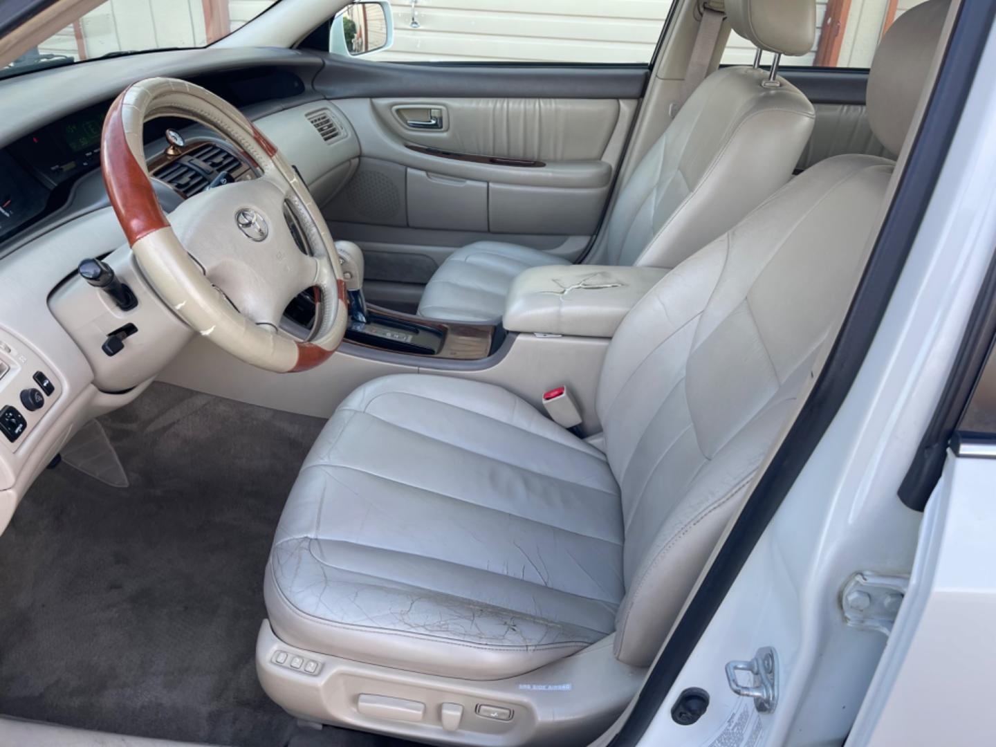 2002 Alpine White /Tan Toyota Avalon XLS (4T1BF28B42U) with an 3.0 V6 engine, AT transmission, located at 813 E Fairview Ave, Meridian , ID, 83642, (208) 336-8230, 43.618851, -116.384010 - Photo#8